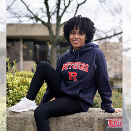 female student with black rutgers hoodie